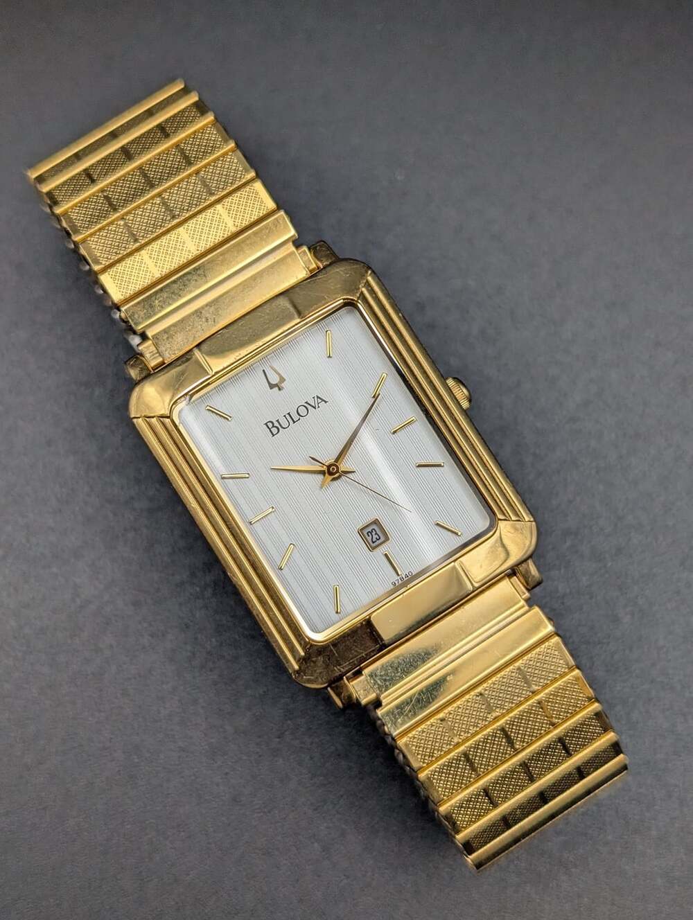 Vintage Bulova Gold-Tone Quartz Tank Watch, Textured Dial Date Window Stretch Ba